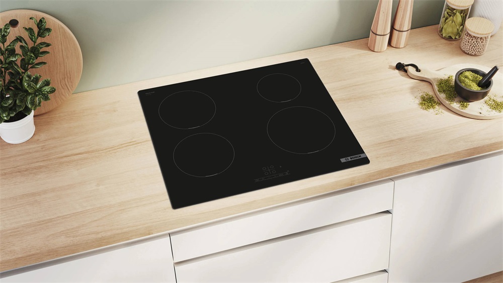 Bosch PUE611BB5E fekete, beépíthető, indukciós, főzőzóna: 4, beépíthető méret: 56cm, főzőlap (Újszerű)